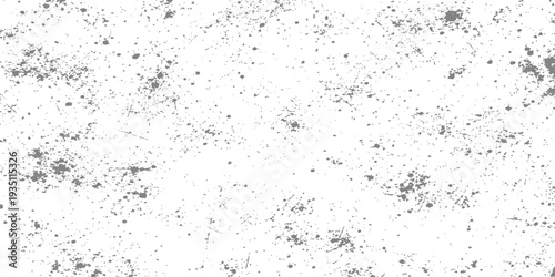 Abstract grunge background texture featuring a vintage paper design with old paint stains and rough stone patterns on a dusty surface with ink drops