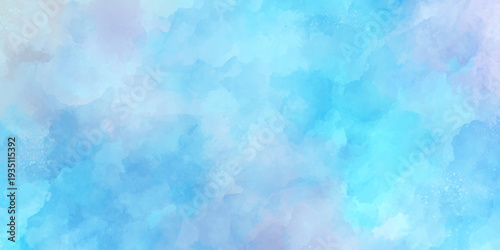 A soft and ethereal watercolor wash in shades of blue and pastel pink creates an abstract artistic background