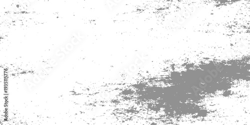 An old grey concrete wall with a rough grunge texture and dirty paint splatter creates a vintage abstract background design on a weathered stone surface