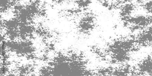 A vintage black ink wash creates an abstract grunge texture background with a dirty paint pattern and floral snowflake design for a winter wallpaper