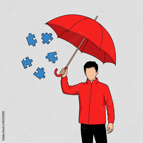 Man shielding puzzle pieces with an umbrella against raining