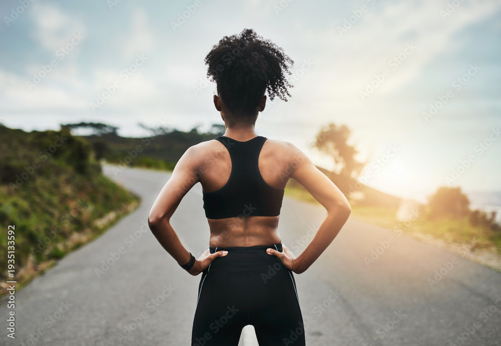 Obraz premium Woman, back and athlete with fitness on mountain road for workout, cardio exercise and view in nature. Female person, runner and confidence with summer, health and outdoor for endurance training