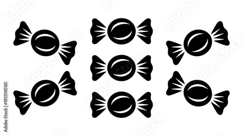A delightful arrangement of six identical black silhouette wrapped candy icons scattered on a surface.
