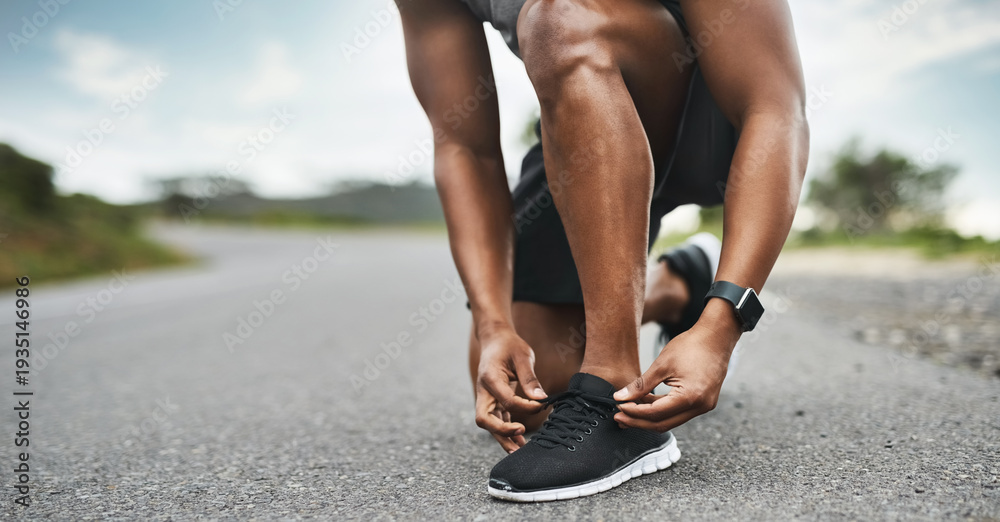 Fototapeta premium Hands, shoelace and man in city, exercise for health benefits and smart watch to track progress. Outdoor, runner and person with sneakers, fitness and practice for wellness, start day and athlete