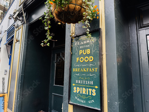 Wallpaper Mural Classic London pub sign advertising British food breakfast and spirits in London Torontodigital.ca