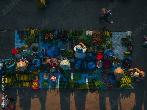 Aerial view of busy local daily life of the morning local market in Vi Thanh or Chom Hom market, Mekong Delta, Vietnam.