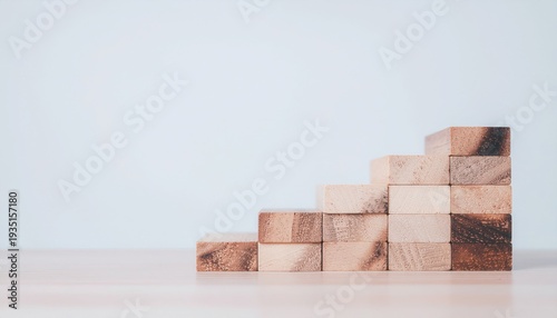 Wooden Blocks Stacked Carefully Into An Upward Staircase Shape