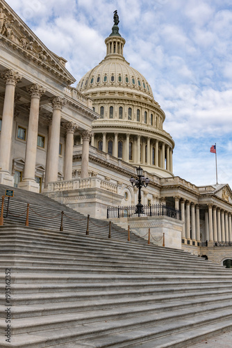Capitol dome skyline cloudy patriotic. Capitol building landmark in Washington DC. Congress legislation Senate politics. Capitol historic facade Capitol.
