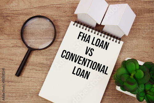FHA Loan Vs. Conventional Loan text written notepad with house model and magnifying glass on wooden background