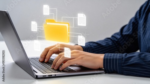 Tableau sur toile Businessperson typing on laptop with glowing digital folder interface,document m