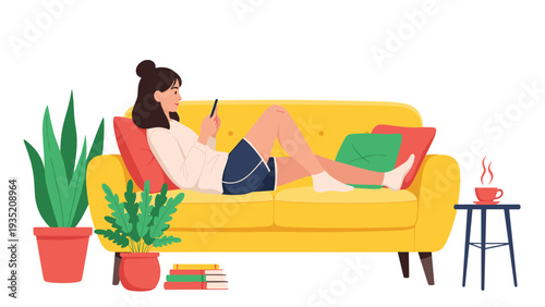 Young woman relaxing on a comfortable yellow sofa while scrolling through social media on her smartphone in a cozy room.