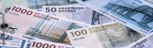 Tableau sur toile Danish krone money bills pile on table