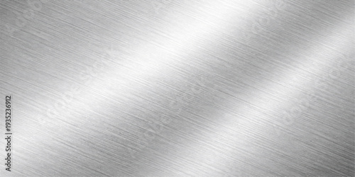 Abstract an elegant metallic surface boasts a sleek, reflective quality with subtle light play. Its texture hints at the strength and sophistication of the material.