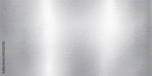 Abstract a close-up photograph showcasing a gleaming brushed steel surface, illuminated to highlight the subtle textures and cool tones.