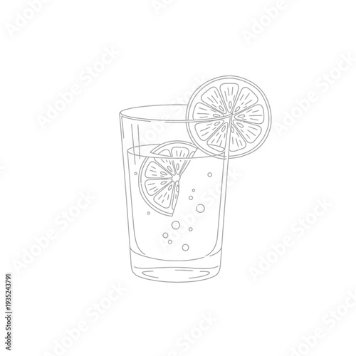 A refreshing glass of lemonade with lemon slices and bubbles.
