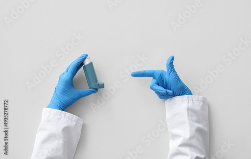 Female doctor's hands point...