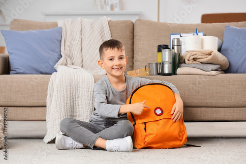 Little boy with emergency b...
