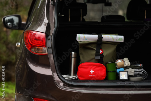 Open car trunk with emergen...