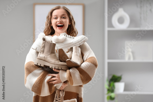 Happy young woman with diff...