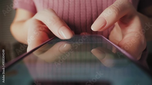Person holding smartphone and typing message on touchscreen in social media. Concept of people and technology. Chatting with friends or colleagues.