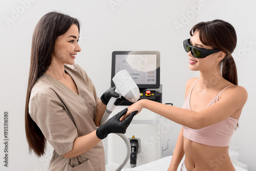 Female cosmetologist perfor...