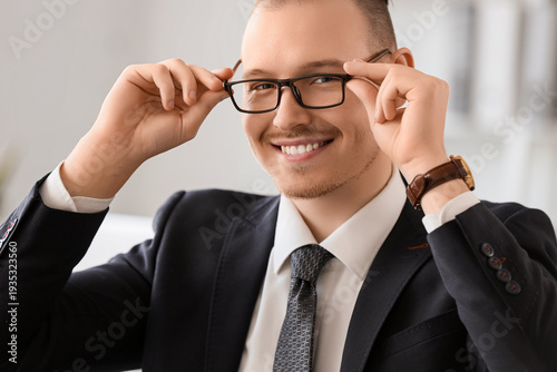 Handsome businessman in eye...