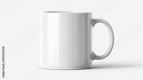 A plain, white ceramic mug sits on a white surface, simple and clean, with a curved handle