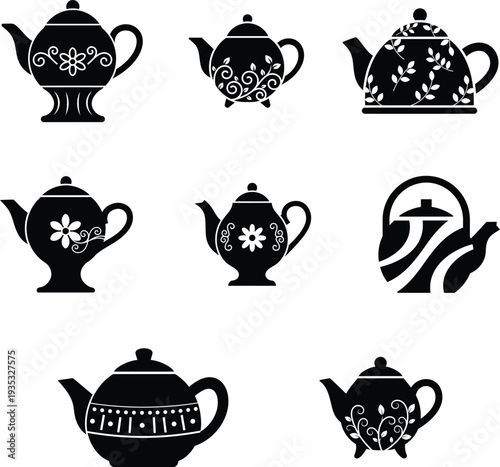 Black tea pots with various white floral and leaf decorations