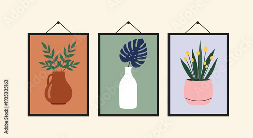Three framed posters with vases and plants hanging on a wall.