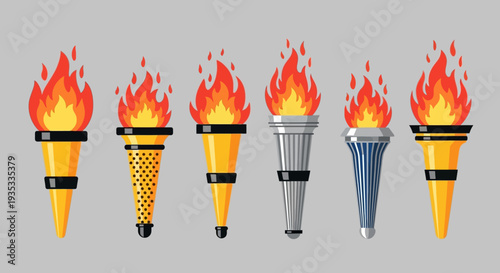 Collection of variously designed Olympic torches with flames.