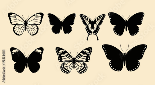 Collection of black and white butterfly silhouettes on beige background.