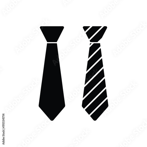 Two black ties one solid and one diagonally striped are displayed