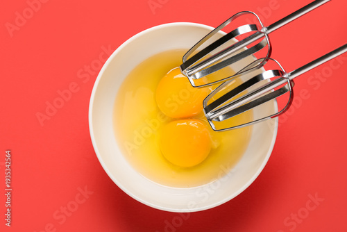 Chrome beaters with bowl of...
