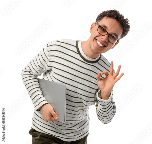 Young man with laptop showi...