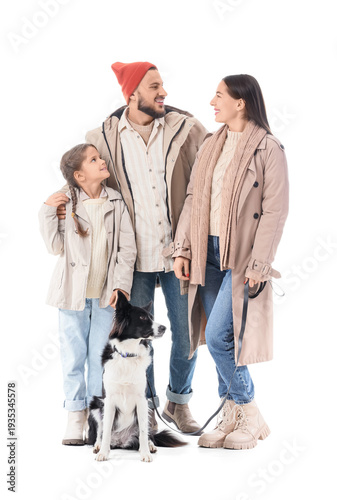 Happy family with dog in au...