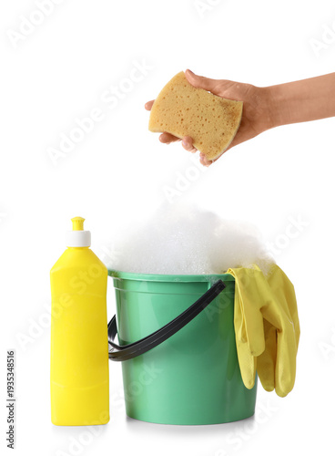 Female hand with sponge, ru...