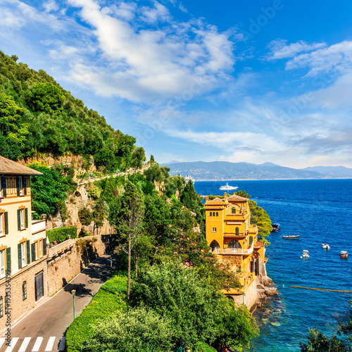 amazing coastal landscape of summer season hotel resort with green trees, sea beach and amazing sunset or sunrise cloudy sky on background