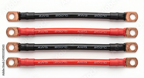 Set of four short pre-crimped red and black battery AWG cables with heavy duty copper lugs isolated on white background