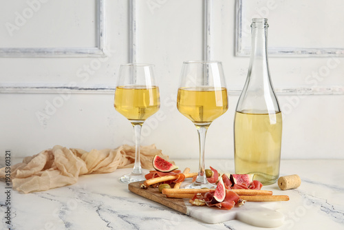 Board with tasty jamon slic...