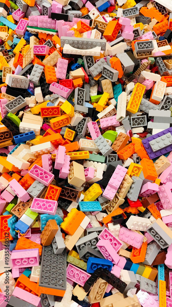 Obraz premium Top view of pile of various colorful authentic Lego plastic bricks and building blocks on January 3, 2026 in Bangkok, Thailand.