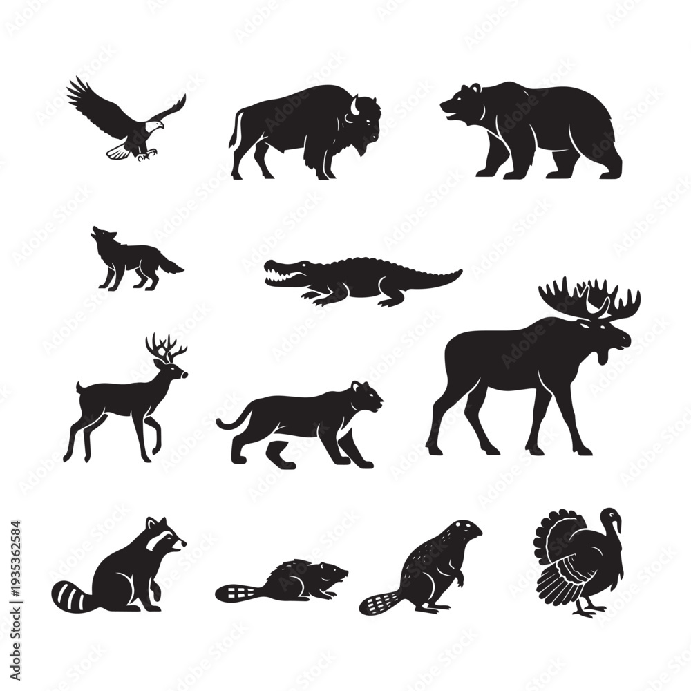 Obraz premium A collection of black animal silhouettes on a white background