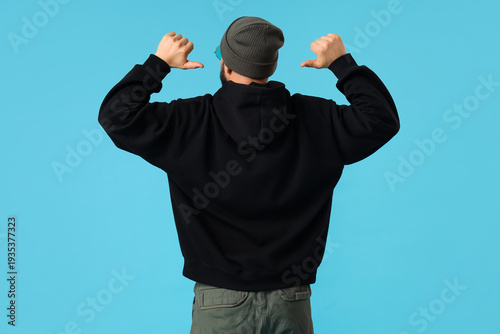 Stylish young man in black ...