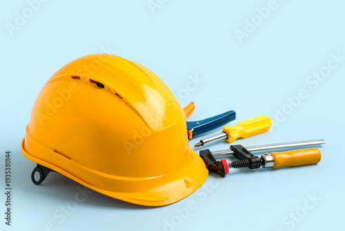 Yellow hardhat and construc...