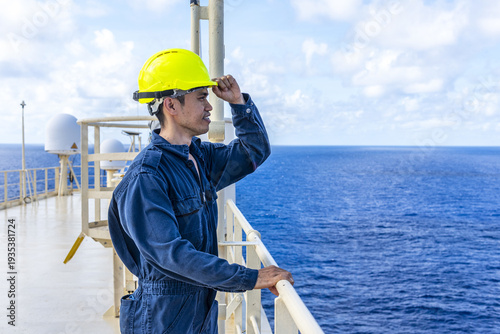 Cuadro en lienzo Seafarer from the engine department standing outdoors on cargo ship deck during sea passage