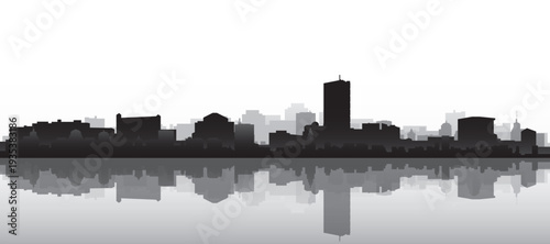 Black and white panoramic poster of the city skyline with misty background buildings and water reflection of BOSTON, UNITED STATES