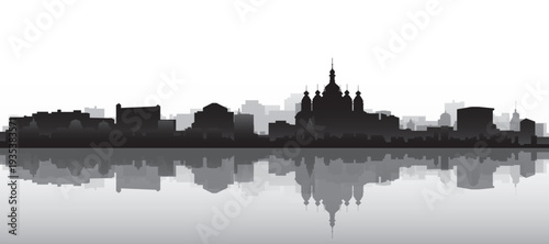 Black and white panoramic poster of the city skyline with misty background buildings and water reflection of KYIV, UKRAINE
