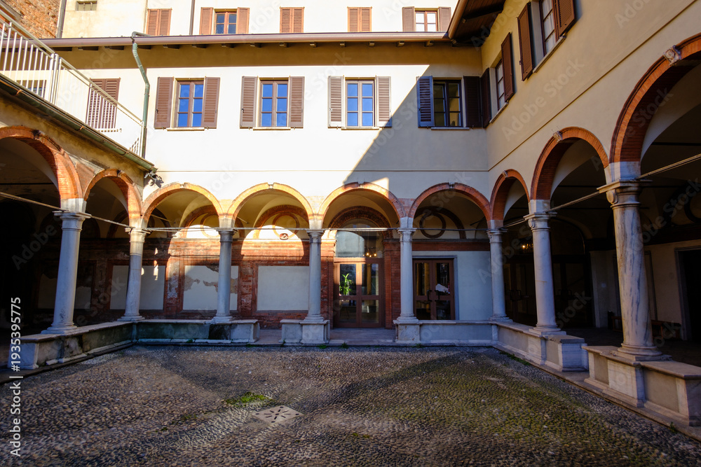 Fototapeta premium Exterior of the historic Santa Maria alla Fontana church in Milan, Italy. A cloister