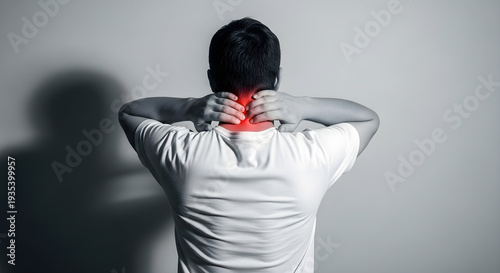 Man experiencing neck pain and discomfort