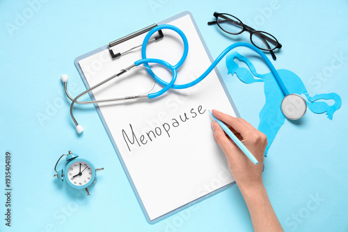 Female hand writing word ME...