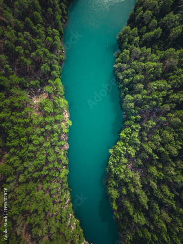 Quadro su tela Aerial drone view of turquoise river canyon landscape